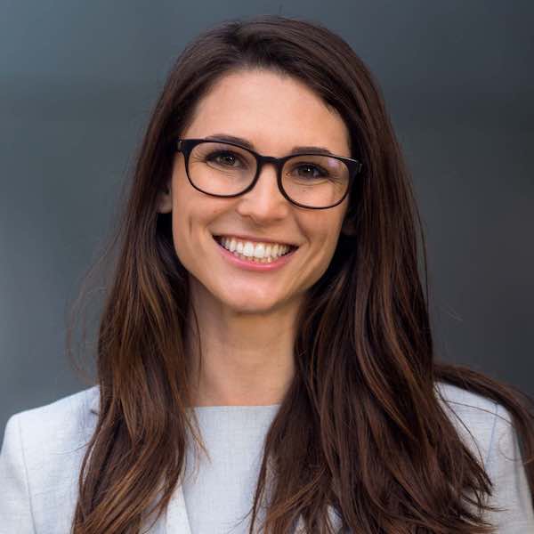Smart, intelligent, friendly, likable portrait of an executive business woman manager, advisor, agent, representative with glasses